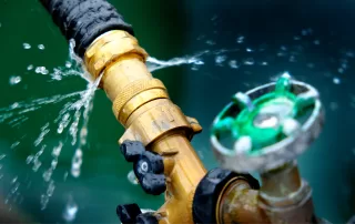 green outdoor hose spigot leak