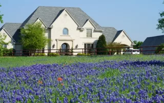 residential home in the texas hill country with texas bluebonnet